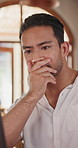 Man, thinking and stress with laptop in cafe for mistake, pressure or remote work in cafeteria. Thoughtful, male person or frustrated on computer with headache or migraine for deadline in coffee shop