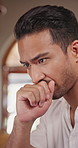 Man, thinking or problem solving with laptop in home for decision, business idea or strategy. Male person, remote work or freelancer contemplating choice with solution on computer for option in house