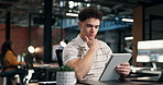 Man, tablet and scroll with thinking in office at night, ideas for marketing campaign or online research. Person, digital technology and social media insight with late planning and brand awareness