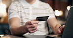 Ecommerce, laptop and hands with card in office, online shopping or financial investment on website. Typing, info and business person with technology, banking and digital payment with discount on app