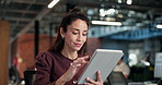 Woman, tablet and scroll in office at night, marketing campaign and online research with smile. Mature, person and technology for social media management, planning and brand awareness with late work