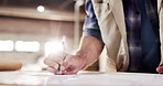 Hands, carpenter and writing at workshop with document, planning and design sketch for production. Person, drawing and paperwork in factory for carpentry, blueprint draft and manufacturing furniture