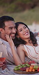 Picnic, beach and happy couple for selfie, photography or memory together on date for bonding. Man, woman and smile outdoor to relax for photo, capture moment and fruit snack on blanket with wine