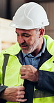 Construction, supervisor and ppe meeting with jacket for labor safety, site induction and compliance. Mature foreman, man and discussion for workwear briefing, company policy and professional conduct