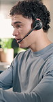 Help, service and man with headset in call center for customer support or online advice in office. Contact us, coworking or agents with chat for virtual assistance, CRM or communication in agency