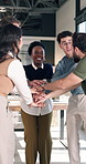 Business, people and handstack in meeting with smile, good news and celebration for finance deal. Happy, team or staff in office with applause, motivation and congratulation for financial achievement