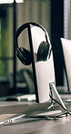 Office, computer and call center with headphones for CRM agency, customer service or support. Empty, building or desk with technology or equipment for virtual assistance, telecommunication or help