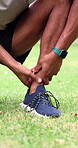 Athlete, hands and ankle sprain at park from runner injury, muscle fatigue and torn ligament. Fitness, person and tendon massage outdoor from exercise accident, joint inflammation and foot discomfort