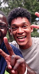 Fitness, face and happy men at park for selfie, laughing or profile picture after physical activity. Friends, smile and people with peace sign on workout break, outdoor and photography in nature