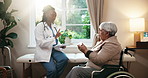 Wheelchair, pills and doctor with senior woman for prescription, medication and medical service. Healthcare, talking and person explain with medicine, antibiotics and treatment for patient arthritis