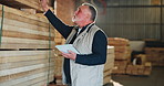 Carpenter, inspection and man on tablet for quality assurance, inventory and stock checklist. Workshop, carpentry and mature person on tech for woodworking, timber production and evaluation report