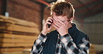 Carpenter, phone call and man in workshop with stress for mistake, error and delay for timber production. Carpentry, frustrated and person on cellphone for communication, contact and schedule problem