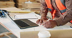 Person, hands or carpenter writing with laptop in warehouse for furniture design or timber project. Carpentry, builder or taking notes with computer or documents for wood production or lumber plan
