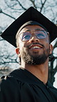 Future, graduation and thinking with happy man outdoor for ceremony at college or university. Knowledge, milestone and smile with thoughtful graduate at event for higher education or scholarship