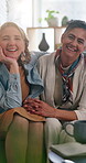 Face, funny and hugging with lesbian couple in home together of affection, commitment or connection. Laugh, lgbt relationship and morning with happy senior women in on sofa apartment for security