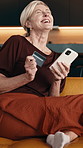 Phone, home and happy woman with credit card for online shopping, purchase success or payment. Excited, mature or female person with smile, smartphone or debit for ecommerce app or winning in house