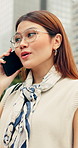 Phone call, happy businesswoman in city with communication, negotiation or finance agreement. Smile, commuting and Asian financial manager on mobile discussion for investment contact in urban town.