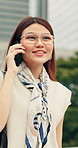 Phone call, walking businesswoman in city with communication, negotiation or finance agreement. Smile, commuting and Asian financial manager on mobile discussion for investment contact in urban town.
