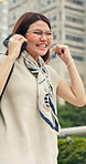Phone, fist pump and woman in city with texting, email or research with good news for finance bonus. Happy, giveaway and Asian financial advisor with cellphone for feedback on job promotion in town.