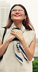 Phone, happy and businesswoman in city with good news, chatting or research on finance bonus. Excited, technology and Asian financial manager with cellphone for feedback on job promotion in town.