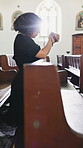 Funeral, worship and rosary with woman in church for memorial service, christian religion or grief. Eulogy tribute, catholic sermon and prayer beads with person in cathedral for belief and chapel