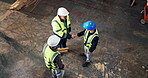 Above, carpentry and handshake with men in warehouse together for discussion or meeting. Agreement, deal and teamwork with people shaking hands in woodworking plant for manufacturing partnership