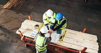 Above, carpentry and hands together with men in warehouse with blueprint, discussion or meeting. Agreement, deal and teamwork with people in woodworking workshop for manufacturing partnership