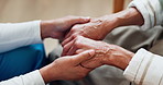 Caregiver, support and holding hands with senior woman for empathy, compassion and comforting. Nursing home, healthcare and nurse with elderly person for sympathy, wellness and care for bonding