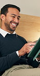 Laugh, tablet and business man in hotel for internet, check emails and travel agenda for hospitality. Happy, bed and person on tech for planning, online itinerary and website on break for work trip