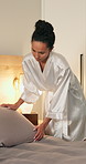 Tidy, bed and woman with pillow in home for cleaning, maintenance and housekeeping in morning. Bedroom, house and person with bedding, blanket and cushion for neat, organize and start day with chores