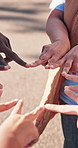 Hands, group and people in nature for volunteering, support and solidarity for community service. Huddle, team or star sign at park with trust, ngo collaboration and synergy for social responsibility