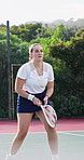 Woman, player and racket on court for tennis, fitness and match practice for competition event. Female person, serve and play on turf with ball, padel contest and sports training for tournament game