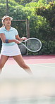 Woman, playing and racket on court for tennis, fitness and match practice for competition event. Person, player and technique on turf with ball, padel contest and sports training for tournament game