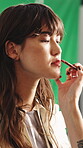 Preparation, woman and artist on set with makeup, getting ready and beauty process in film bts. Makeover, people and actress with lip gloss, cosmetic application and backstage in cinema production.