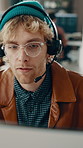 Telemarketing, computer and man in call center, speaking or communication for insurance sales. Telesales agent, headset and person with feedback for coverage policy, premium benefits and coworking