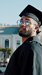 Future, graduation and thinking with man outdoor for ceremony at college or university. Knowledge, milestone and scholarship with thoughtful graduate at event for higher education or school success