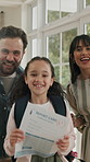 Family, face and home with child for report card, good results or well done together. Portrait, mom and dad with happy kid, smile or paper for academic record, term end or semester success in house