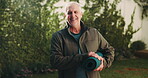 Face, smile and old man with yoga mat in garden for holistic wellness, health or practice. Portrait, yogi or person with exercise equipment at backyard for pilates, fitness and active retirement