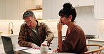 Laptop, couple or argument for budget in kitchen, wrong expenses or mortgage paperwork. Computer, mature man and woman with bills, financial conflict and pointing with disagreement for cost at home