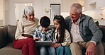 Grandparents, kids and sofa with tablet for interaction, online game or engagement in home. Grandpa, grandma and children playing with technology together for network, connection or app in house