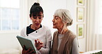 Caregiver, tablet and talk in retirement home with old woman, medical records or advice for wellness. Healthcare worker, tech and senior person in bedroom with discussion, diagnosis report or support