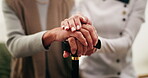 Holding hands, home and old woman with caregiver, cane and wellness in health community. Elderly person with a disability, support and retirement with walking stick for compassion or medical service