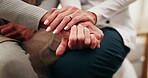 Holding hands, home and old woman with caregiver, comfort and wellness in health community. People, closeup and elderly person with support, retirement and help with compassion or medical service