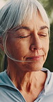 Senior woman, outdoor and mindfulness on break, peace and thinking after physical activity or memory. Retirement, fitness and old person with thoughts, breathing and contemplating on weekend at park