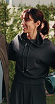 Happy, friends and hug in backyard for fitness, discussion and feedback on training session. Trainer, senior people and laugh at house with embrace, funny conversation and pilates advice for wellness