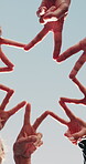 Blue sky, people and hands together with peace sign for fitness, support and wellness. Nature, teamwork and personal trainer with huddle for solidarity, exercise goal or motivation in low angle