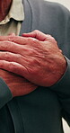 Hands, old man and stress in home with chest pain, heart attack or symptoms of medical condition. Discomfort, senior person and angina at house with cardiac arrest, lung infection and chronic illness