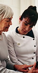 Caregiver, old woman and test for blood sugar, healthcare and checkup for senior care at home. Glucose meter, medical exam and diabetes assessment, help and monitor levels with results in retirement