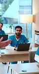 Man, students and lecturer in medical school with laptop, learning knowledge and taking notes online. People, listen and computer in university with nursing course, education and healthcare lesson.