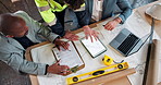 Tablet, men and construction workers on site with blueprint for discussion on renovation or repairs. Clipboard, technology and civil engineers with floor plan for building or maintenance from above.